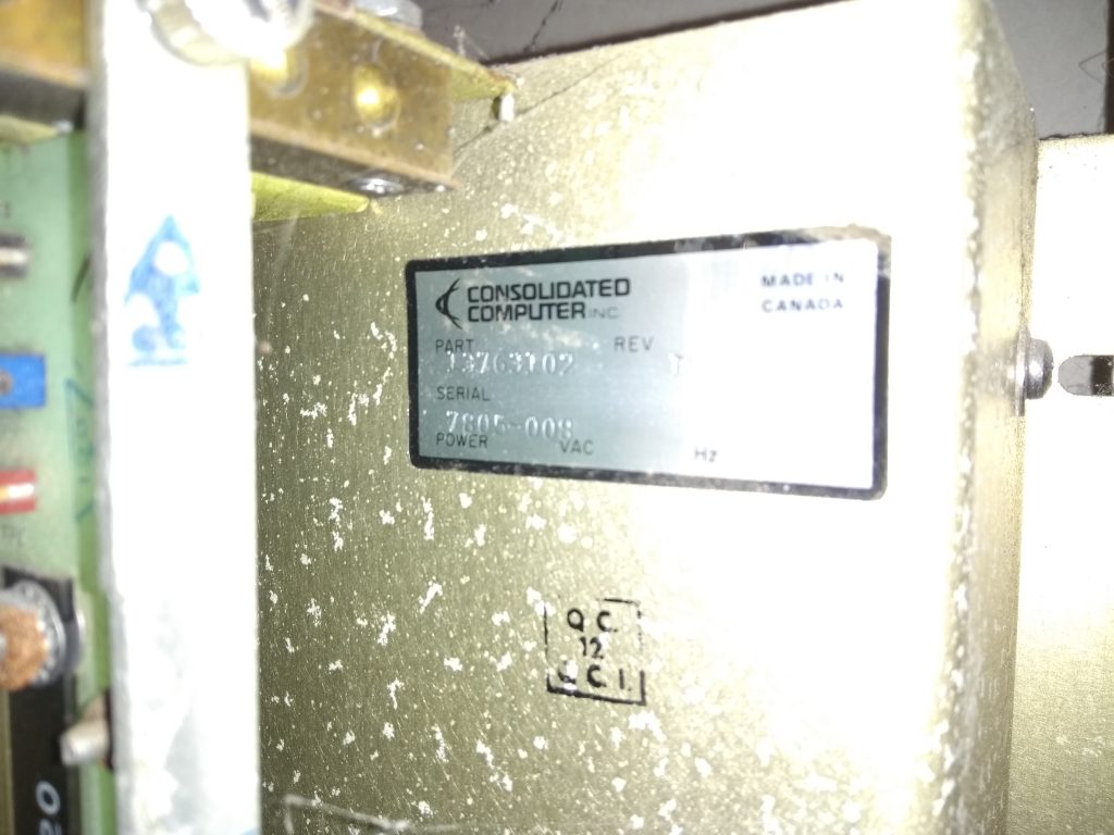 The identity plate inside the cabinet. It shows the CCI logo and text.